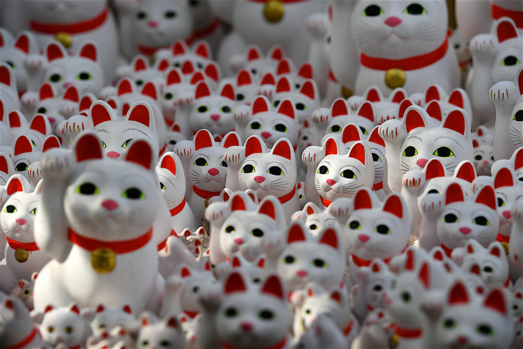 Setagawa,Japan-02 07 2019:Gotokuji, a temple considered at the origin of the well known Maneki-Neko: the cat that welcomes visitors with its right paw up in the air.
