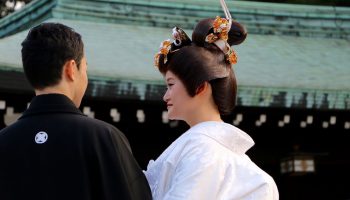 Tokyo,Japan-September 27,2015: a married couple attend Traditional Wedding ceremony at Meiji-Jingu