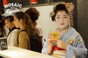 A geisha at the bar of Mosaic Hostel Kyoto