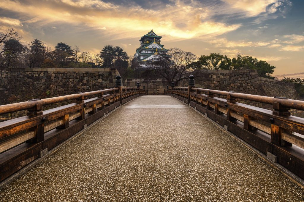 Visit the landmark Osaka castle for a glimpse into the city's feudal past.