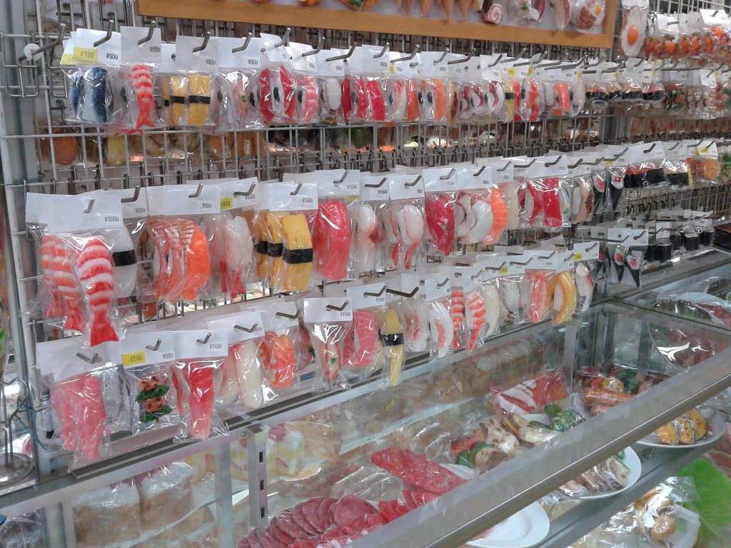 Wall of sushi keyrings in a shop along Kappabashi street,