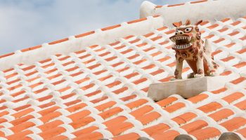 A guardian shisa lion dog, on the roof of an Okinawan home.